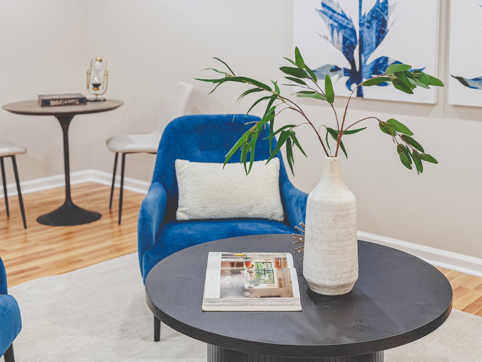 Staged sitting area with blue chairs