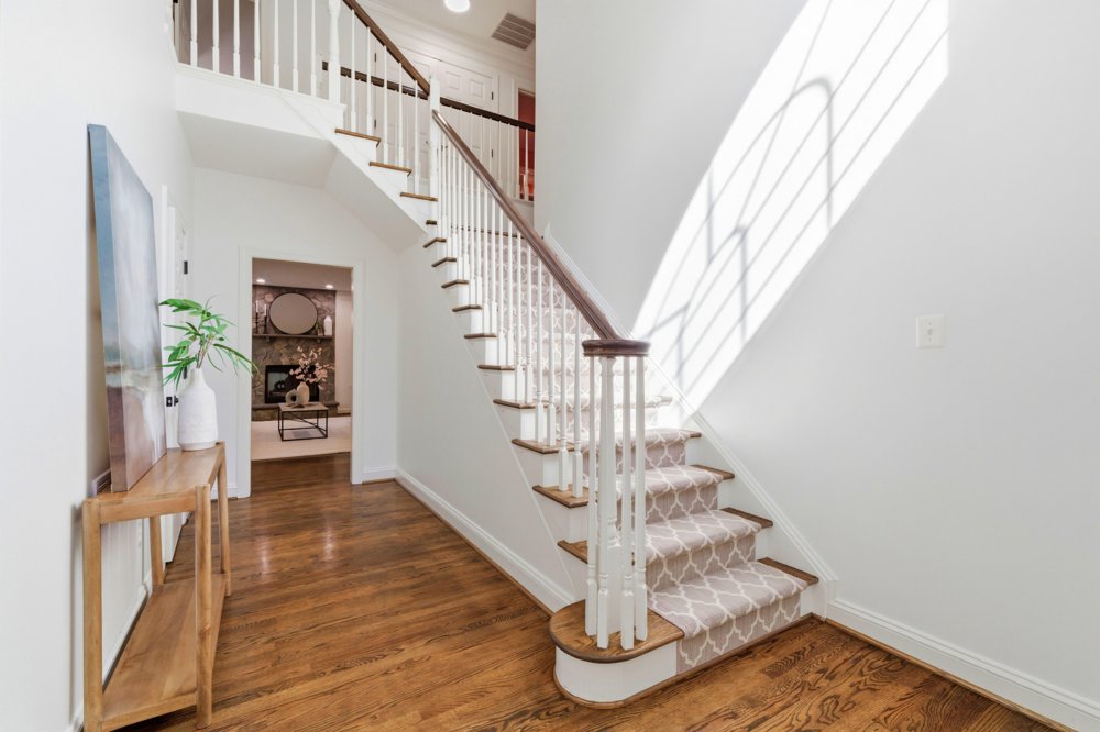 Curved stair with arched window